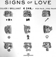 Signs of Love hopea sormukset